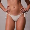 Bas de bikini uni à nouer sur les côtés Bas de bikini uni à nouer sur les côtés