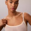 Body minimaliste en maille mi-cuisse Body minimaliste en maille mi-cuisse