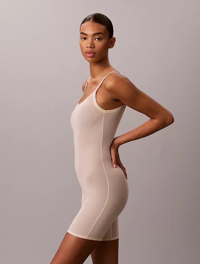 Body minimaliste en maille mi-cuisse Body minimaliste en maille mi-cuisse