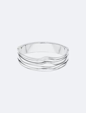 Bracelet rigide à charnière aux formes fluides et sculpturales