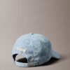 Casquette de baseball en Denim avec logo emblématique sur toute la surface Casquette de baseball en Denim avec logo emblématique sur toute la surface