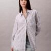 Chemise ample à boutons en popeline rayée Chemise ample à boutons en popeline rayée