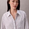 Chemise ample à boutons en popeline rayée Chemise ample à boutons en popeline rayée