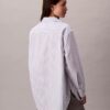Chemise ample à boutons en popeline rayée Chemise ample à boutons en popeline rayée