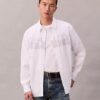 Chemise boutonnée ample en popeline avec logo graphique Chemise boutonnée ample en popeline avec logo graphique