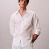 Chemise boutonnée ample en popeline lavée Chemise boutonnée ample en popeline lavée