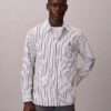 Chemise boutonnée en popeline lavée à rayures Chemise boutonnée en popeline lavée à rayures