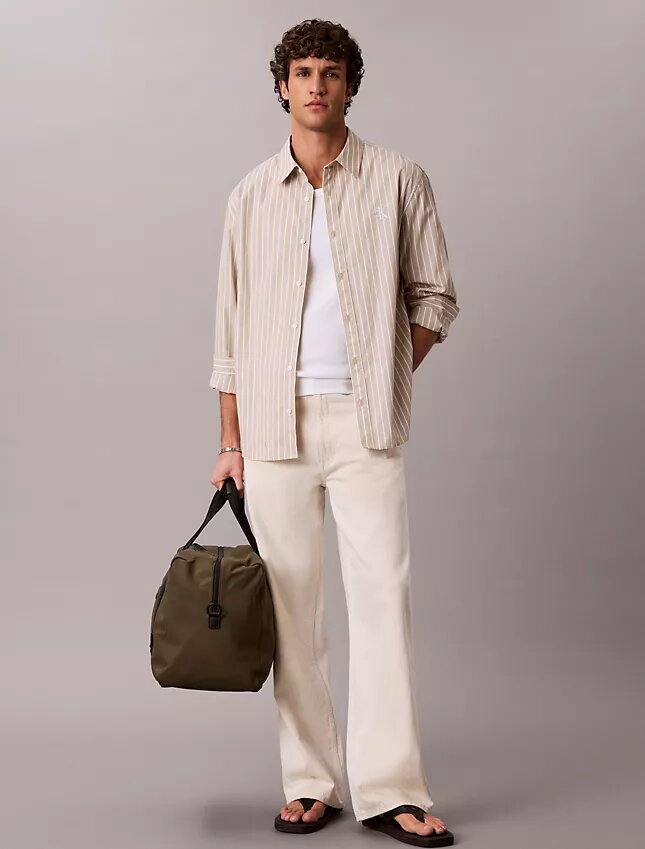 Chemise boutonnée en popeline lavée à rayures Chemise boutonnée en popeline lavée à rayures