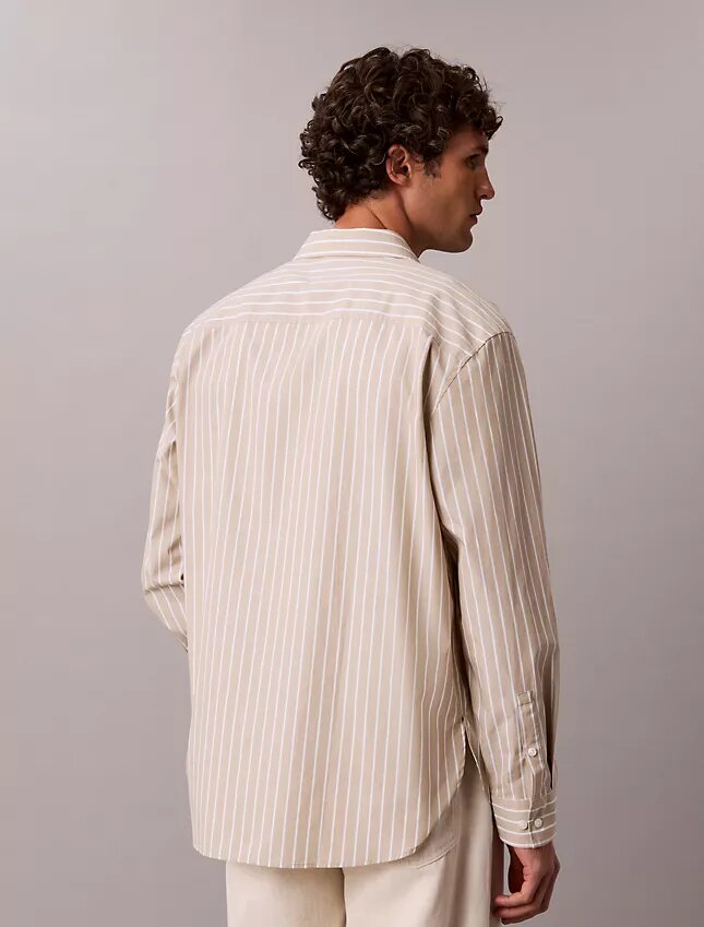 Chemise boutonnée en popeline lavée à rayures Chemise boutonnée en popeline lavée à rayures