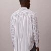 Chemise boutonnée en popeline lavée à rayures Chemise boutonnée en popeline lavée à rayures