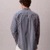 Chemise boutonnée en popeline lavée à rayures Chemise boutonnée en popeline lavée à rayures