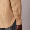 Chemise boutonnée en popeline lavée à rayures Chemise boutonnée en popeline lavée à rayures