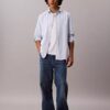 Chemise classique boutonnée en coton Oxford uni Chemise classique boutonnée en coton Oxford uni