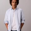 Chemise classique boutonnée en coton Oxford uni Chemise classique boutonnée en coton Oxford uni