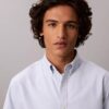 Chemise classique boutonnée en coton Oxford uni Chemise classique boutonnée en coton Oxford uni