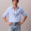 Chemise classique boutonnée en popeline lavée Chemise classique boutonnée en popeline lavée
