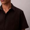 Chemise classique boutonnée en seersucker uni Chemise classique boutonnée en seersucker uni