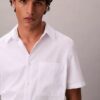 Chemise classique boutonnée en seersucker uni Chemise classique boutonnée en seersucker uni