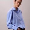 Chemise courte boutonnée en popeline à la coupe décontractée Chemise courte boutonnée en popeline à la coupe décontractée