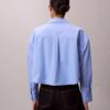Chemise courte boutonnée en popeline à la coupe décontractée Chemise courte boutonnée en popeline à la coupe décontractée