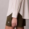 Chemise décontractée boutonnée en popeline de coton rayée Chemise décontractée boutonnée en popeline de coton rayée