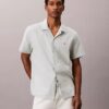 Chemise à manches courtes boutonnée en lin et coton Chemise à manches courtes boutonnée en lin et coton