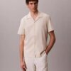 Chemise à manches courtes boutonnée en lin et coton Chemise à manches courtes boutonnée en lin et coton