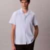 Chemise à manches courtes boutonnée en lin et coton Chemise à manches courtes boutonnée en lin et coton