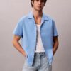 Chemise à manches courtes boutonnée en lin et coton Chemise à manches courtes boutonnée en lin et coton