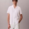 Chemise à manches courtes boutonnée en lin et coton Chemise à manches courtes boutonnée en lin et coton