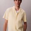 Chemise à manches courtes boutonnée en lin et coton Chemise à manches courtes boutonnée en lin et coton