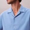 Chemise à manches courtes boutonnée en lin et coton Chemise à manches courtes boutonnée en lin et coton
