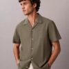 Chemise à manches courtes boutonnée en lin et coton Chemise à manches courtes boutonnée en lin et coton