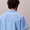 Chemise à manches courtes boutonnée en lin et coton Chemise à manches courtes boutonnée en lin et coton