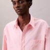 Chemise oversize en popeline de coton boutonnée Chemise oversize en popeline de coton boutonnée