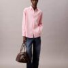 Chemise oversize en popeline de coton boutonnée Chemise oversize en popeline de coton boutonnée