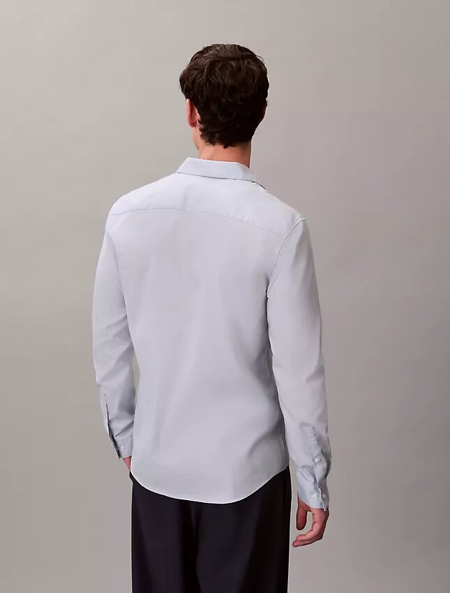 Chemise slim à col boutonné en jacquard géométrique Chemise slim à col boutonné en jacquard géométrique
