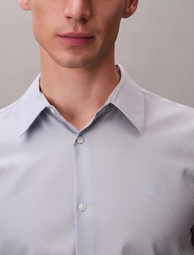 Chemise slim à col boutonné en jacquard géométrique Chemise slim à col boutonné en jacquard géométrique