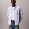 Chemise slim décontractée à rayures et boutons Chemise slim décontractée à rayures et boutons