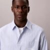 Chemise slim décontractée à rayures et boutons Chemise slim décontractée à rayures et boutons