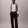 Chemise slim à rayures en tissu technique extensible, col boutonné Chemise slim à rayures en tissu technique extensible, col boutonné