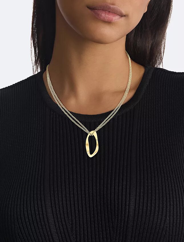 Collier avec pendentif de forme organique arrondie Collier avec pendentif de forme organique arrondie
