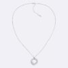 Collier avec pendentif rond sculptural Collier avec pendentif rond sculptural