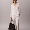 Grand sac fourre-tout avec logo emblématique sur toute la surface et pochette Grand sac fourre-tout avec logo emblématique sur toute la surface et pochette