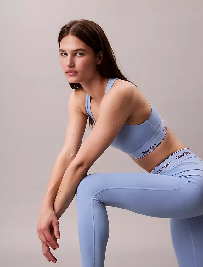 Leggings 7/8 à taille haute et logo, style sportif moderne Leggings 7/8 à taille haute et logo, style sportif moderne