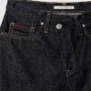 Mini-jupe en denim à taille asymétrique Mini-jupe en denim à taille asymétrique