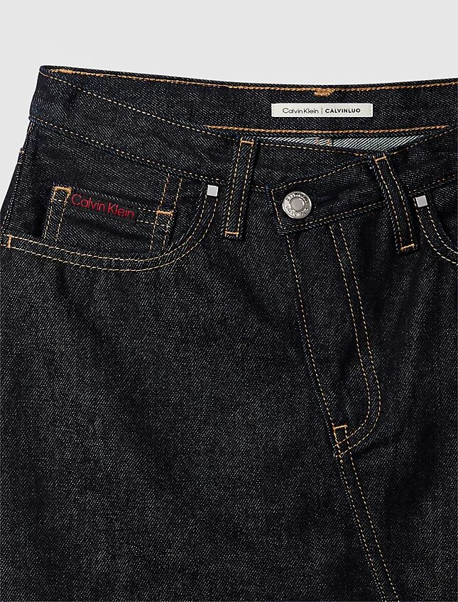 Mini-jupe en denim à taille asymétrique Mini-jupe en denim à taille asymétrique