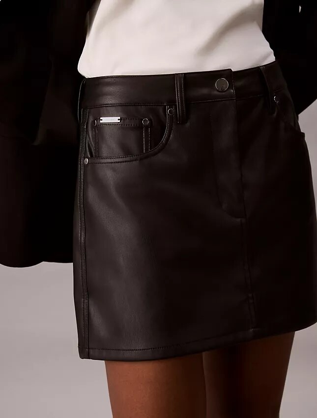 Mini-jupe en simili cuir à 5 poches Mini-jupe en simili cuir à 5 poches