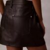 Mini-jupe en simili cuir à 5 poches Mini-jupe en simili cuir à 5 poches