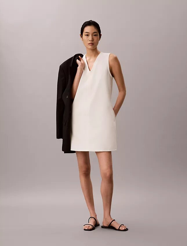 Mini-robe à col en V en interlock Mini-robe à col en V en interlock